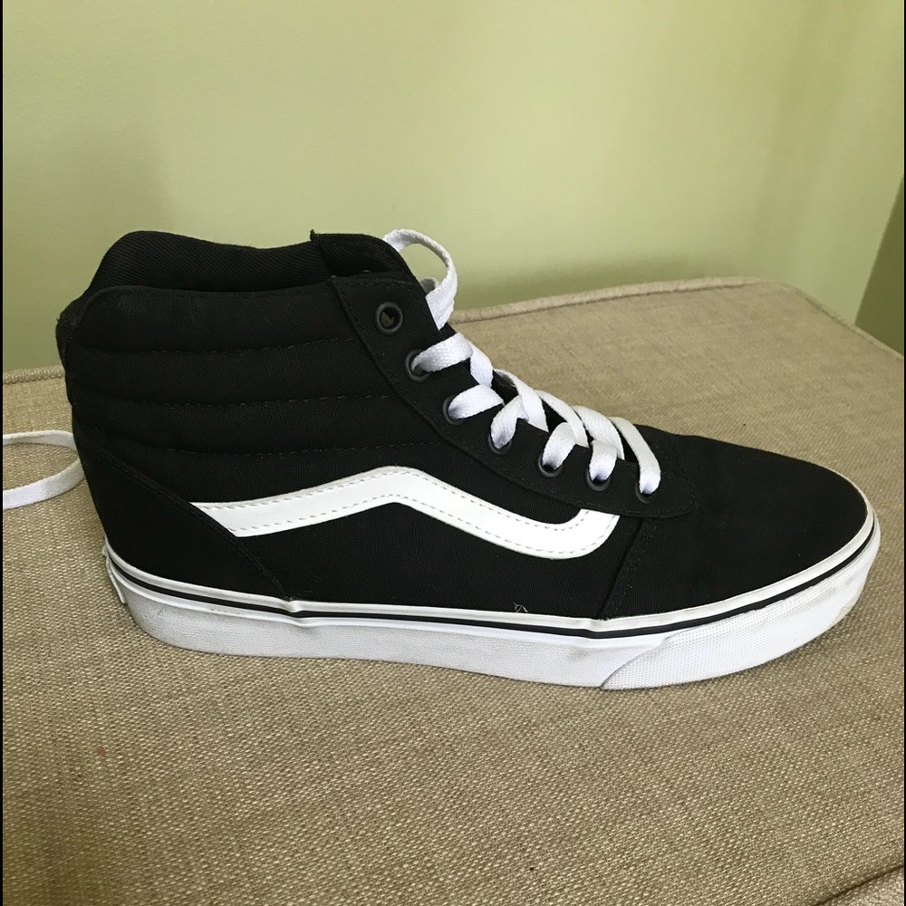 Women’s black high top Vans